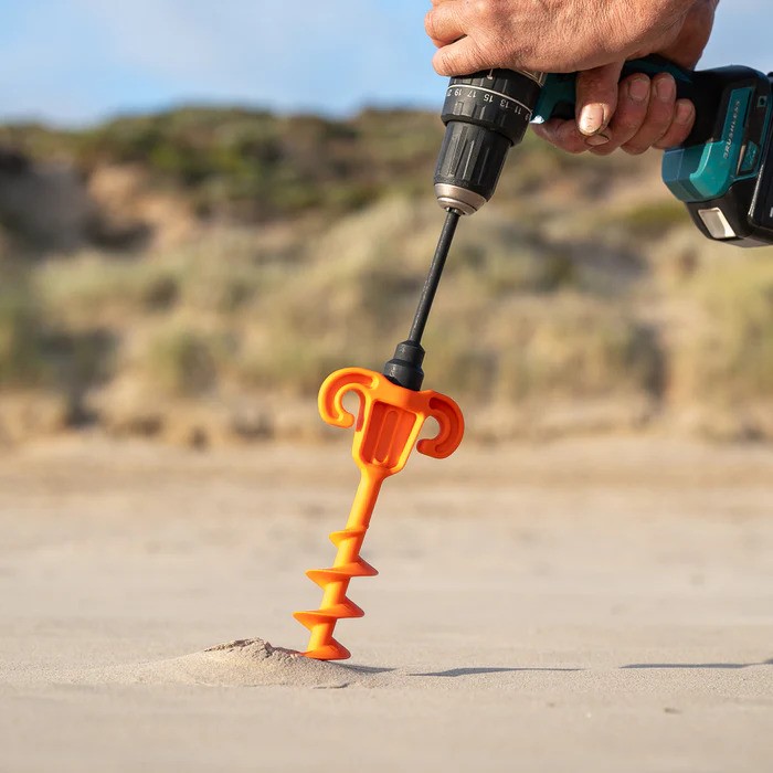 07 Tiegear Review Soft Peg A Tiegear soft peg is drilled into sand.